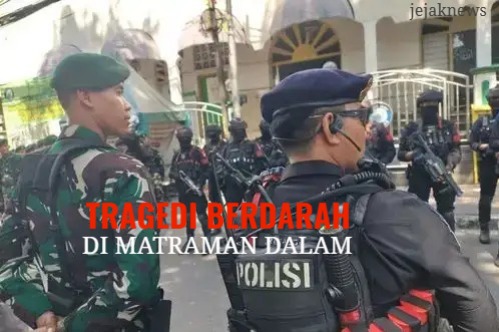Garis polisi yang melintang di depan reruntuhan bangunan dan kendaraan yang hangus terbakar pascabentrokan massal di kawasan perbatasan Jakarta Pusat dan Jakarta Timur.